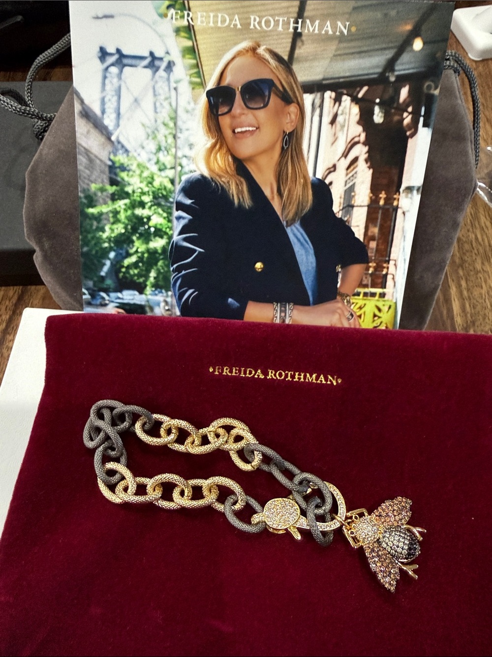 Freida Rothman Lumi gold and black bracelet with bee pendant